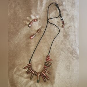Bundle of tribal inspired necklaces (2) and a pair of earrings.